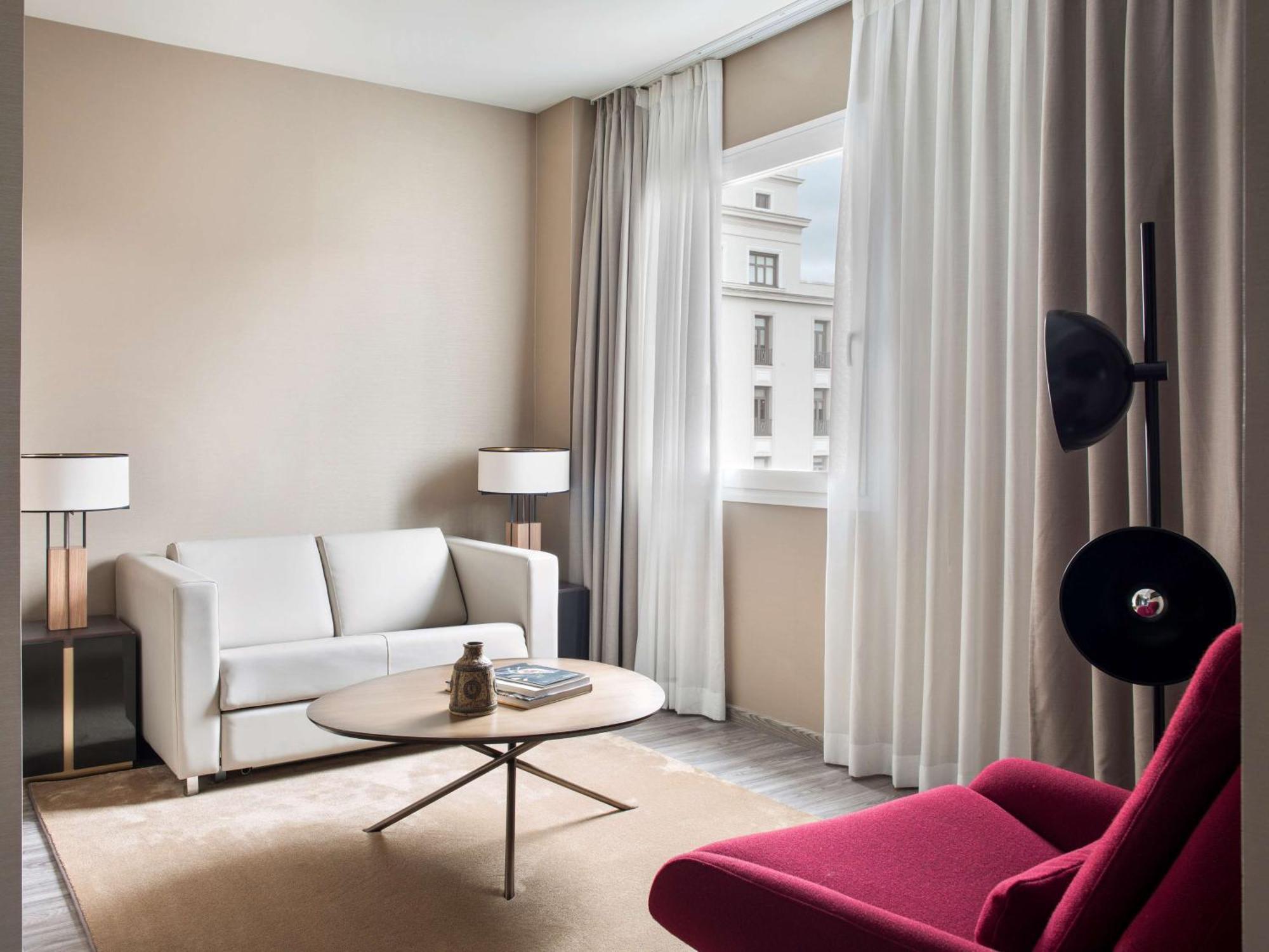 Nh Collection Madrid Suecia Hotel Exterior foto A living room at the hotel