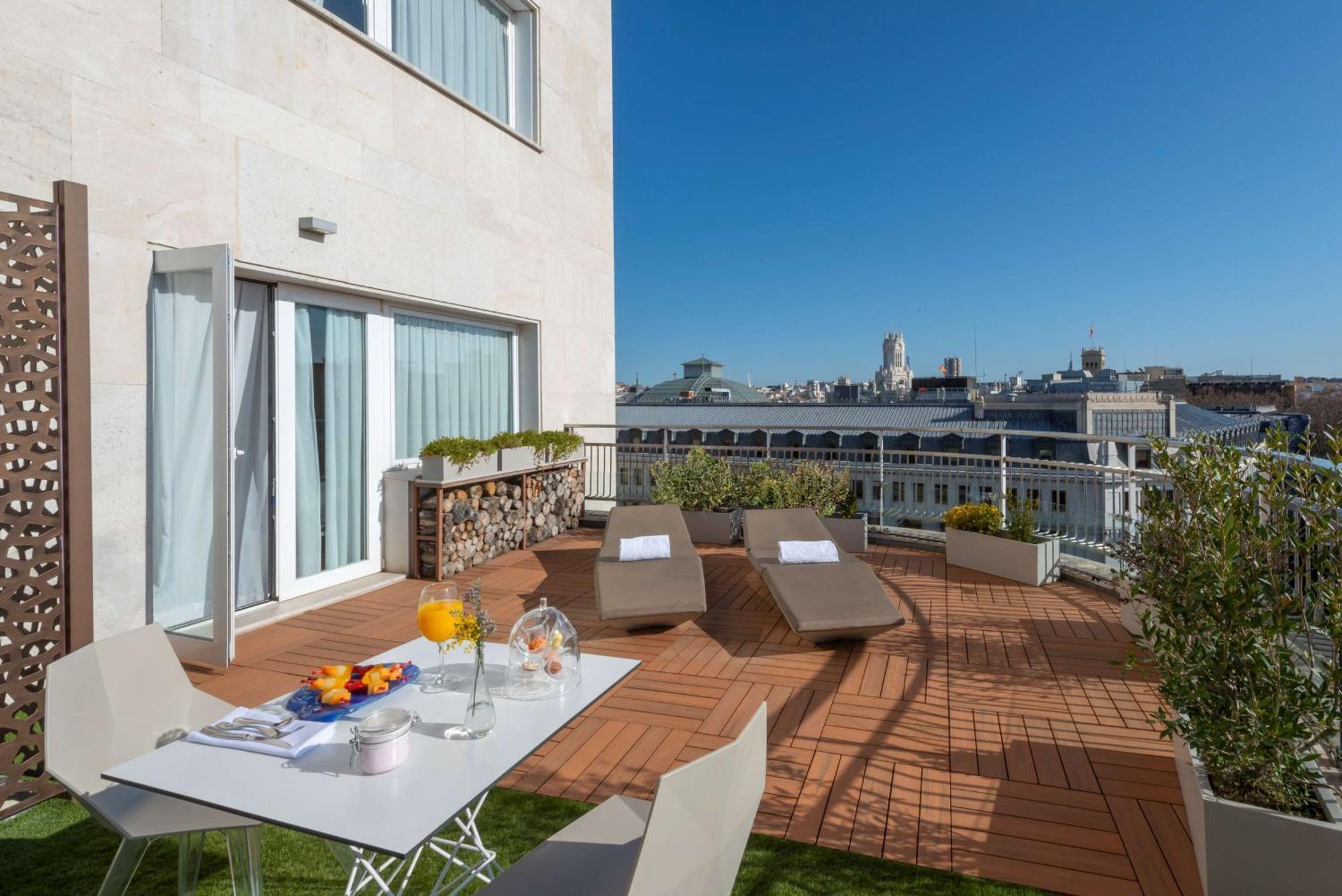 Nh Collection Madrid Suecia Hotel Exterior foto The hotel's rooftop terrace